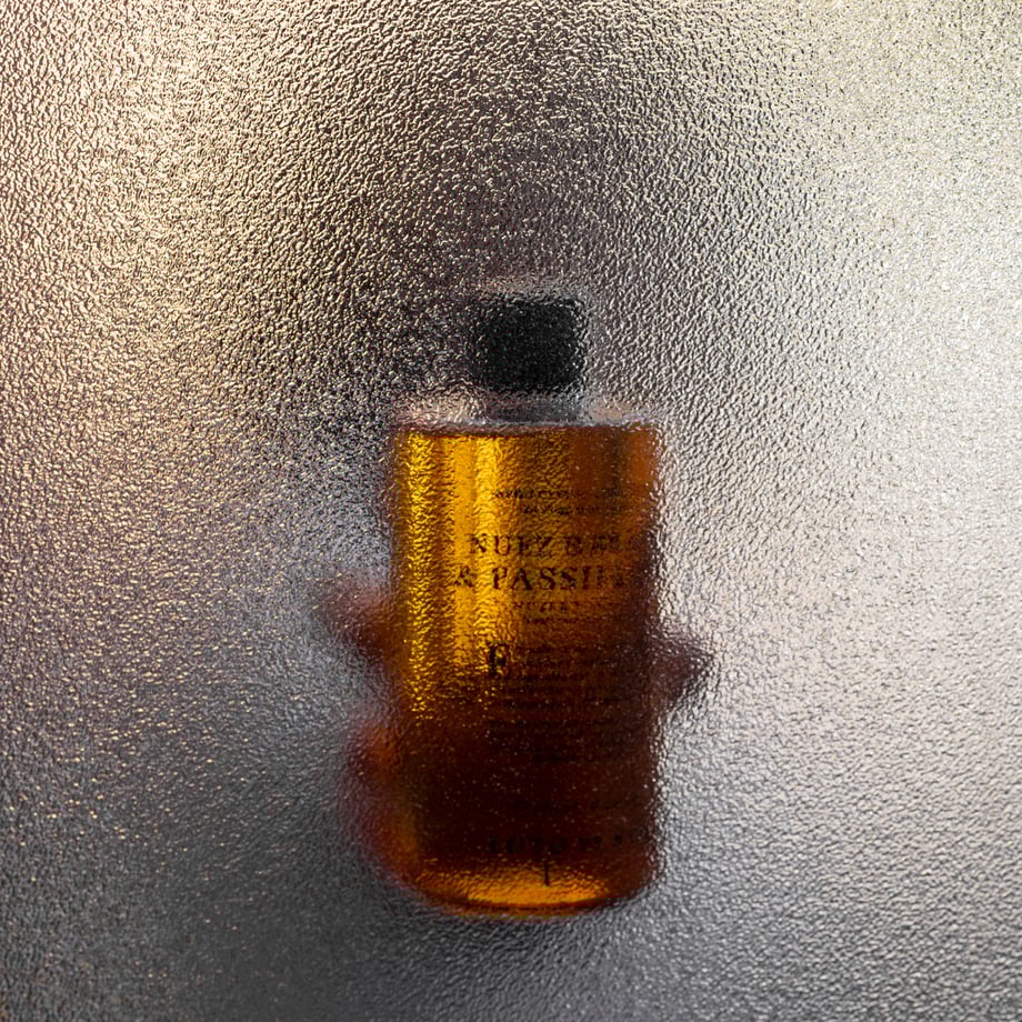 A bottle behind the glass
